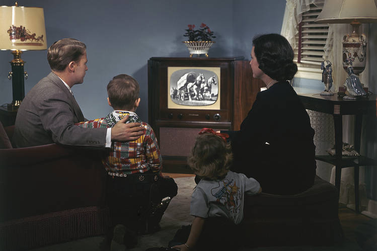 Family watching TV